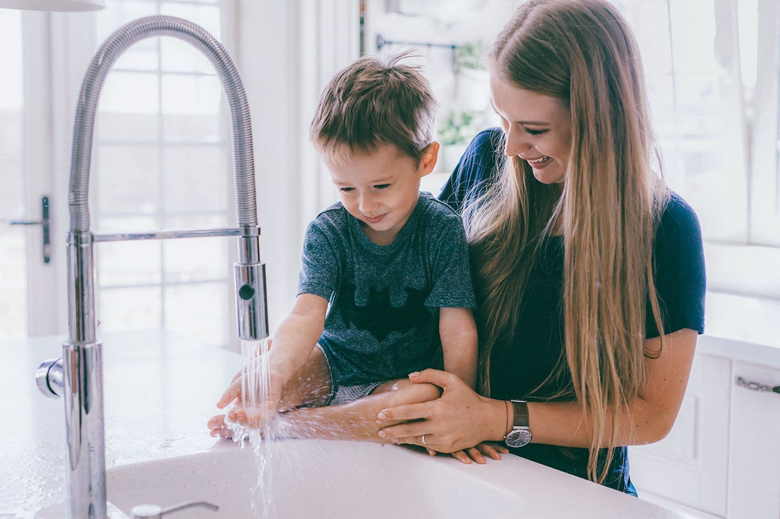 family using sink